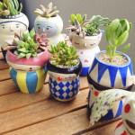 Adorable Face Pots to Brighten Your Day by Polkaros