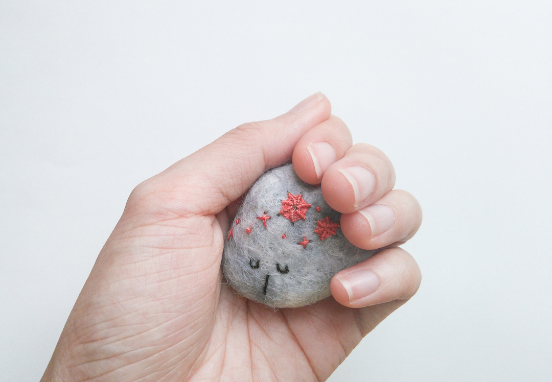 Felted rock art by Shu Ning Lim