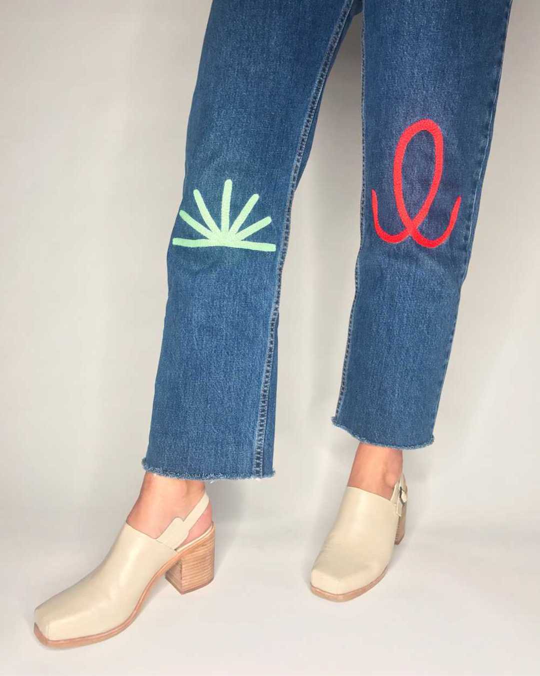 Embroidered denim jeans by Thousand Island