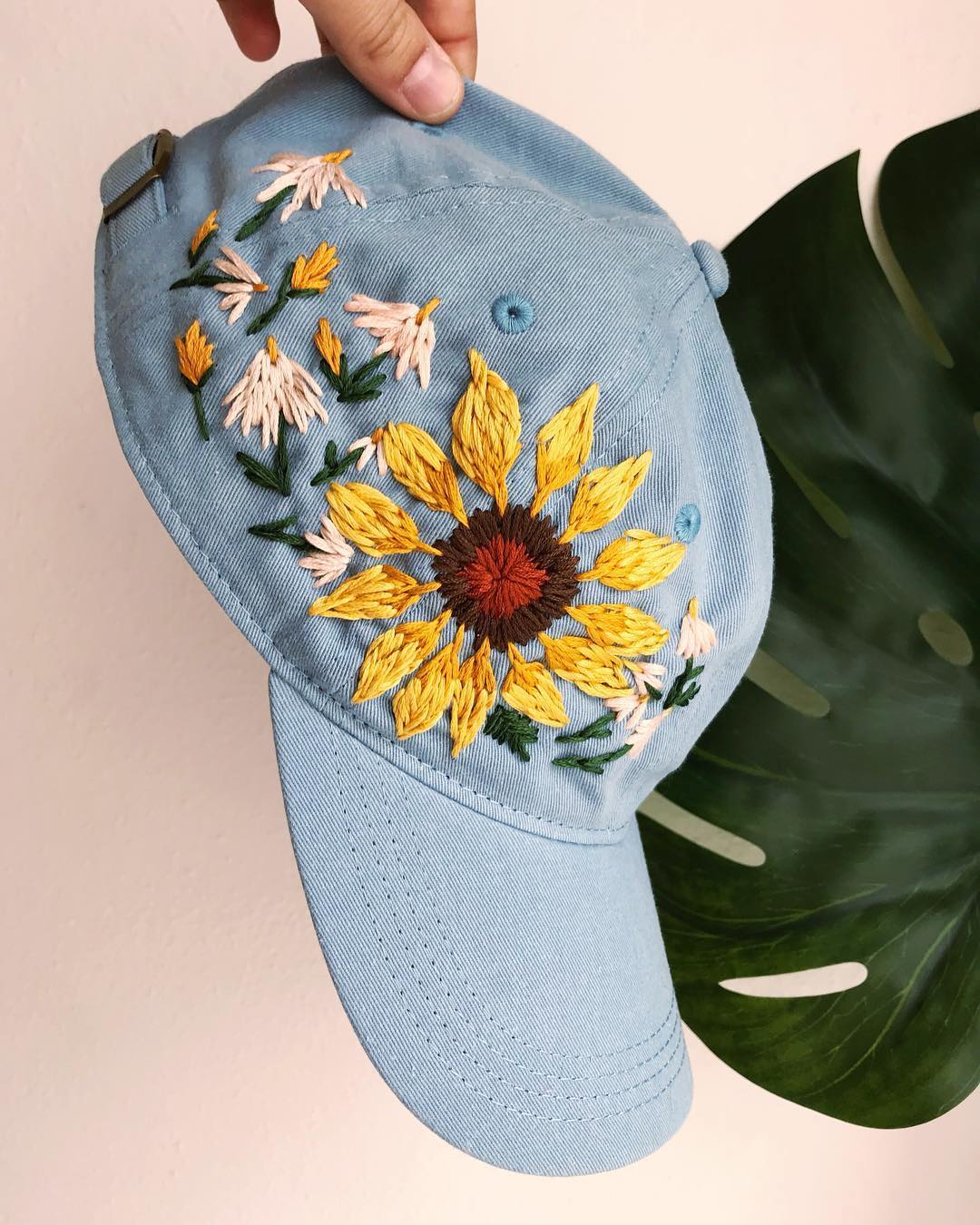 Embroidered hats by Lexi Mire