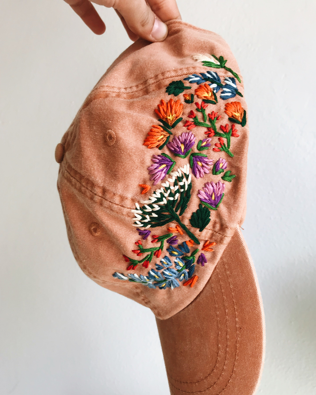 Embroidered hats by Lexi Mire