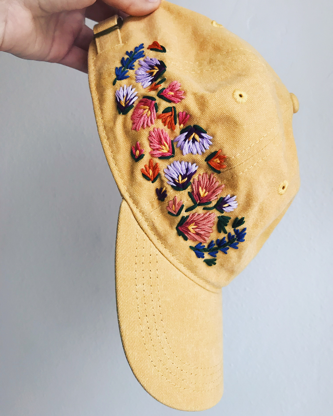 Embroidered hats by Lexi Mire