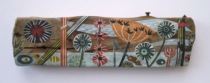 Angie Lewin collage on driftwood