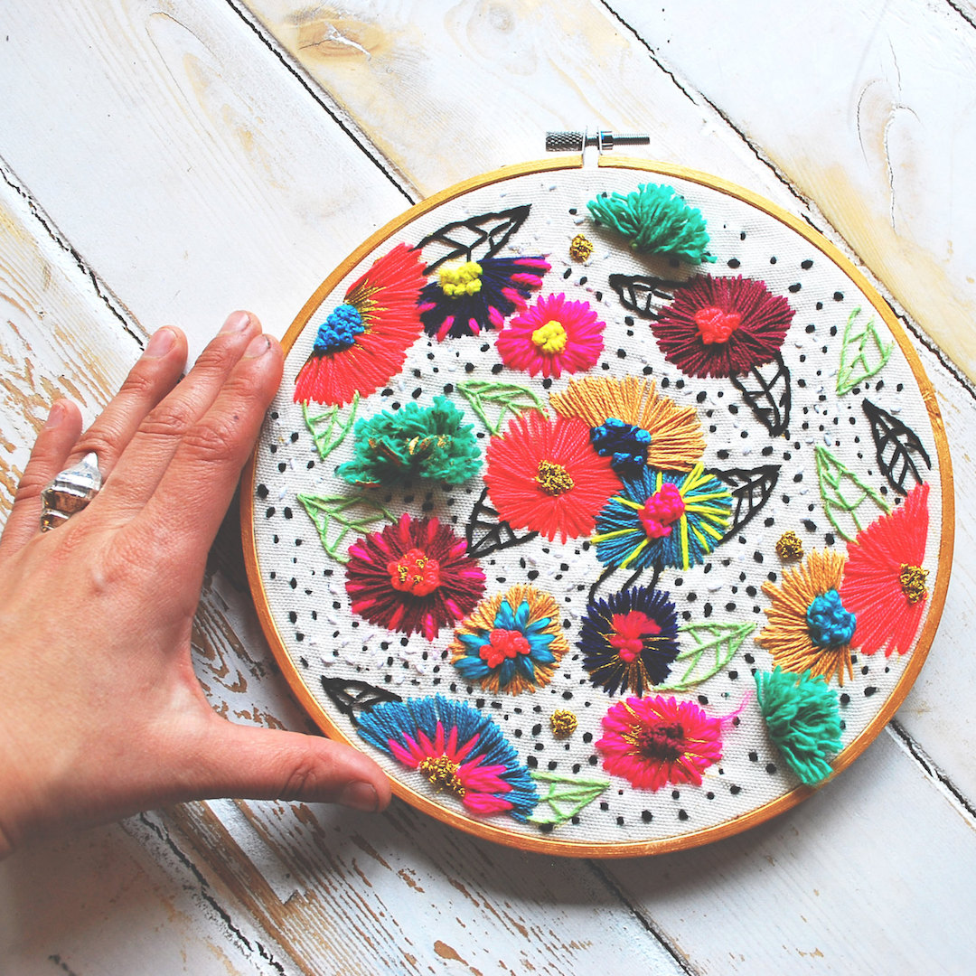 Colorful hoop art by Katy Biele