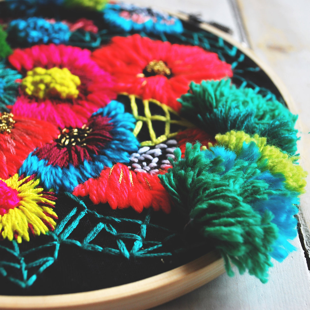 Colorful hoop art by Katy Biele