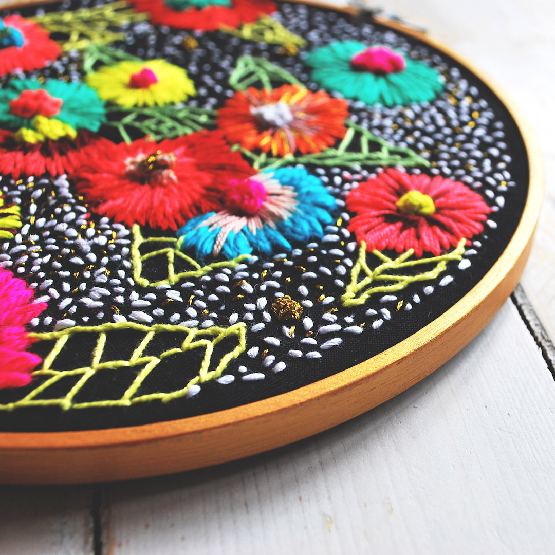 Colorful hoop art by Katy Biele