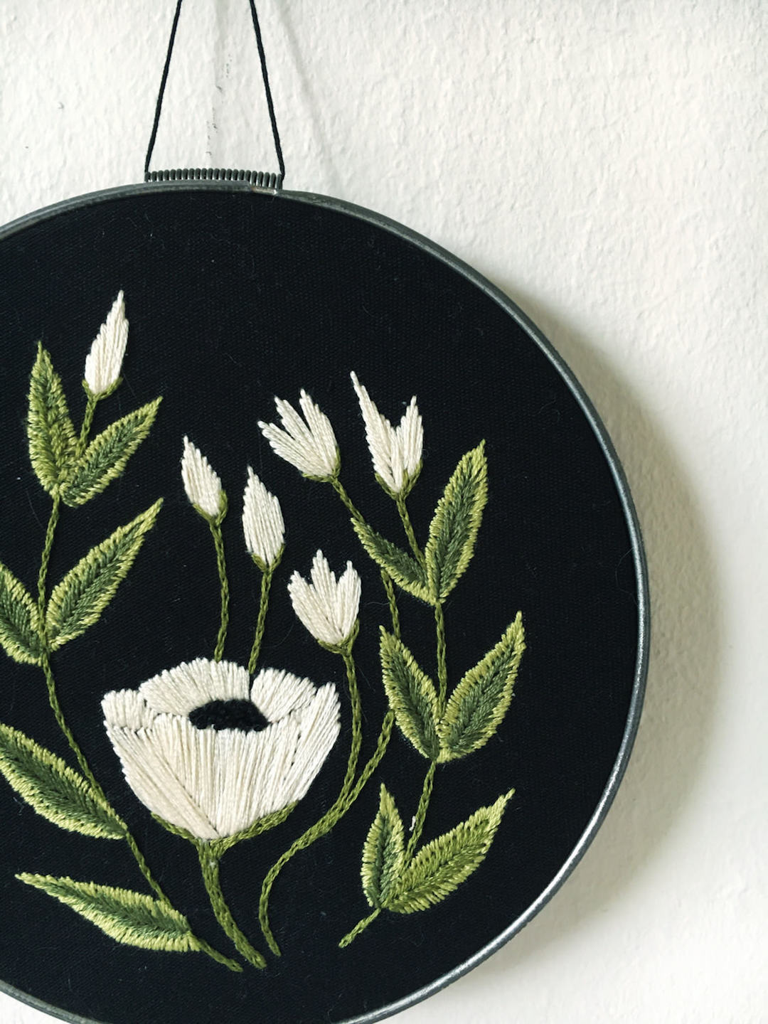 Embroidered hoop art by Tusk and Cardinal