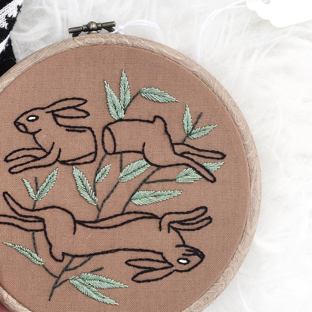 Embroidered hoop art by Tusk and Cardinal