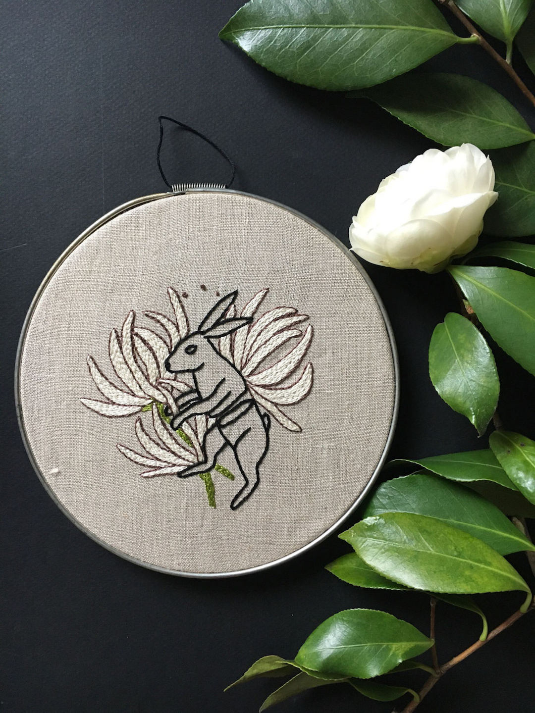 Embroidered hoop art by Tusk and Cardinal