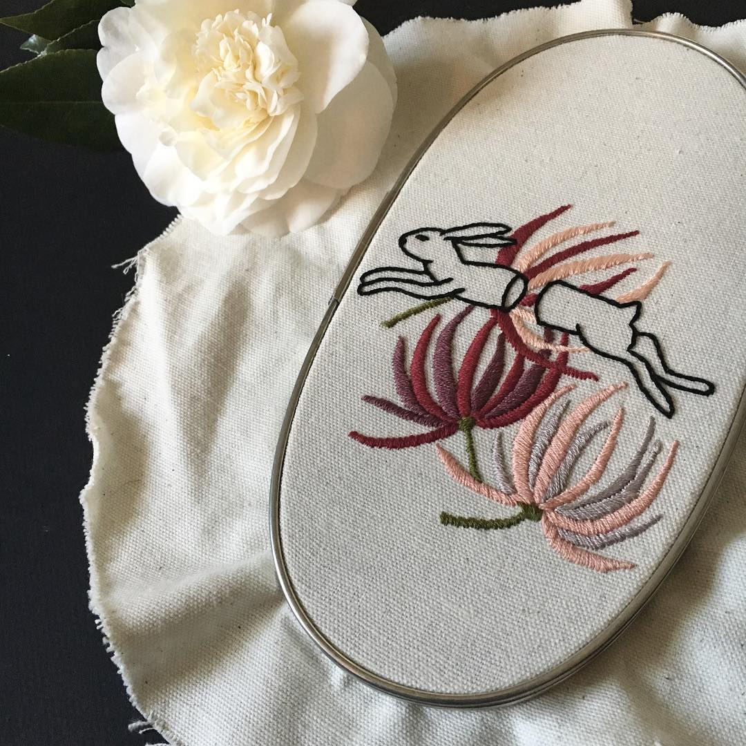 Embroidered hoop art by Tusk and Cardinal