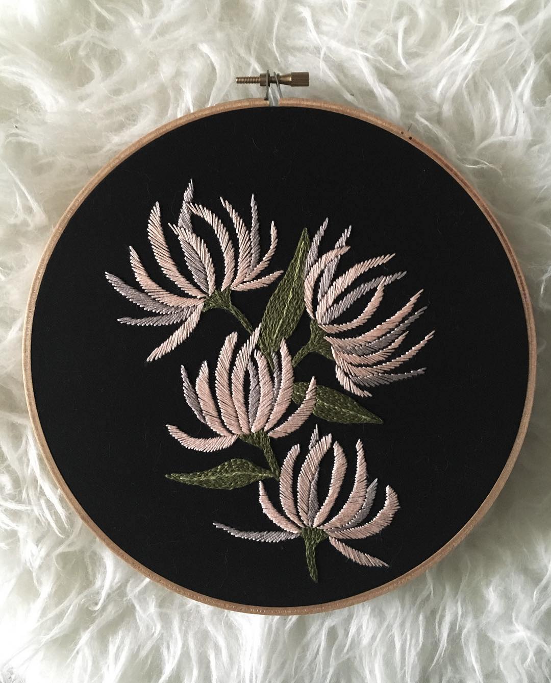 Embroidered hoop art by Tusk and Cardinal