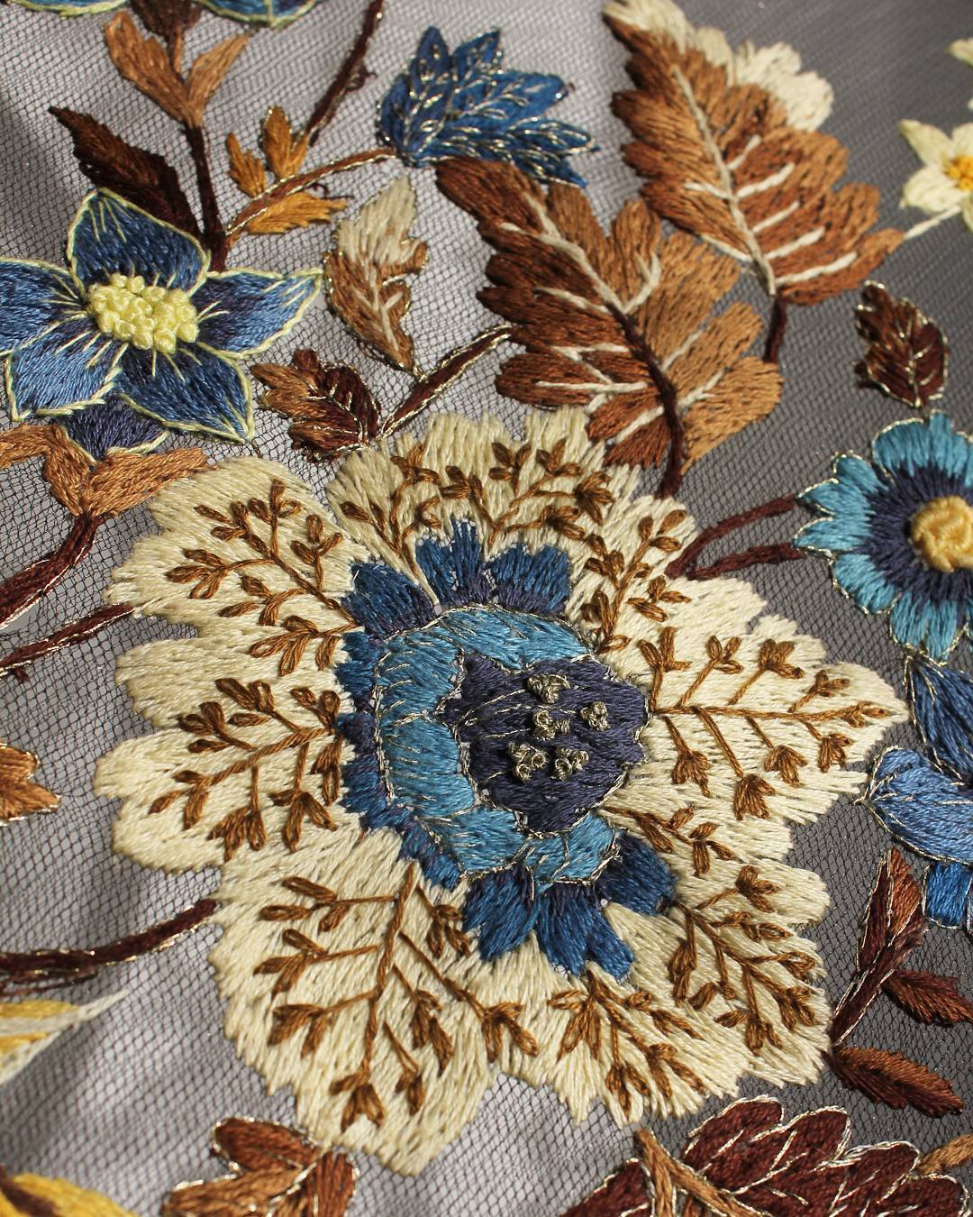 Delicate tulle embroidery looks like its floating in midair