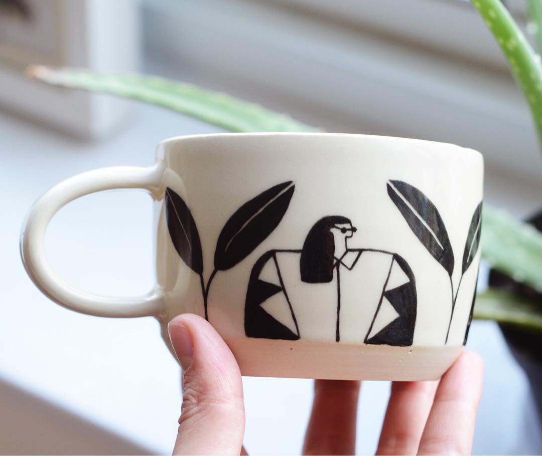 Illustrated coffee mugs by Miri Orenstein