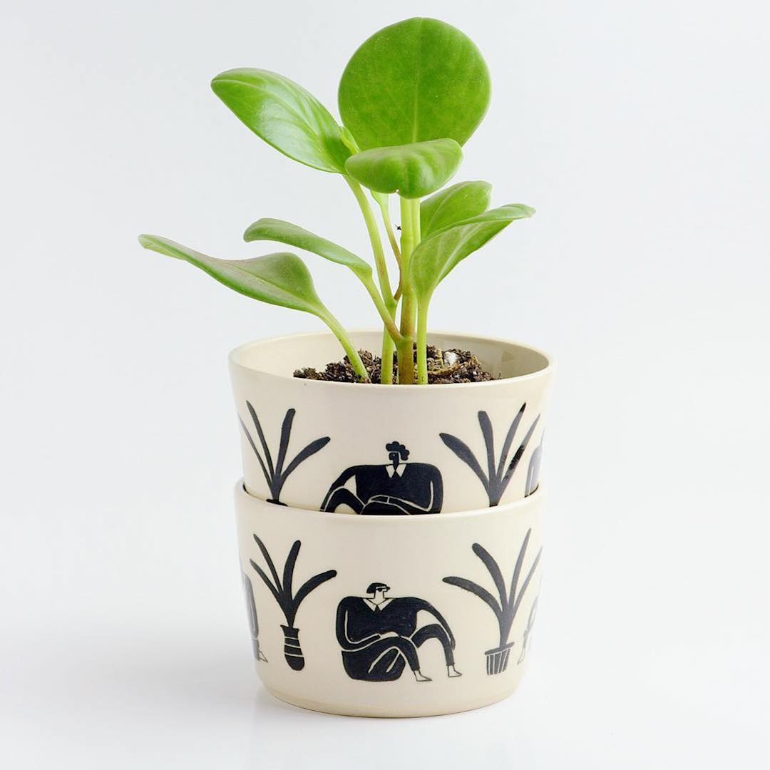 Ceramic planters with paintings of women by Miri Orenstein