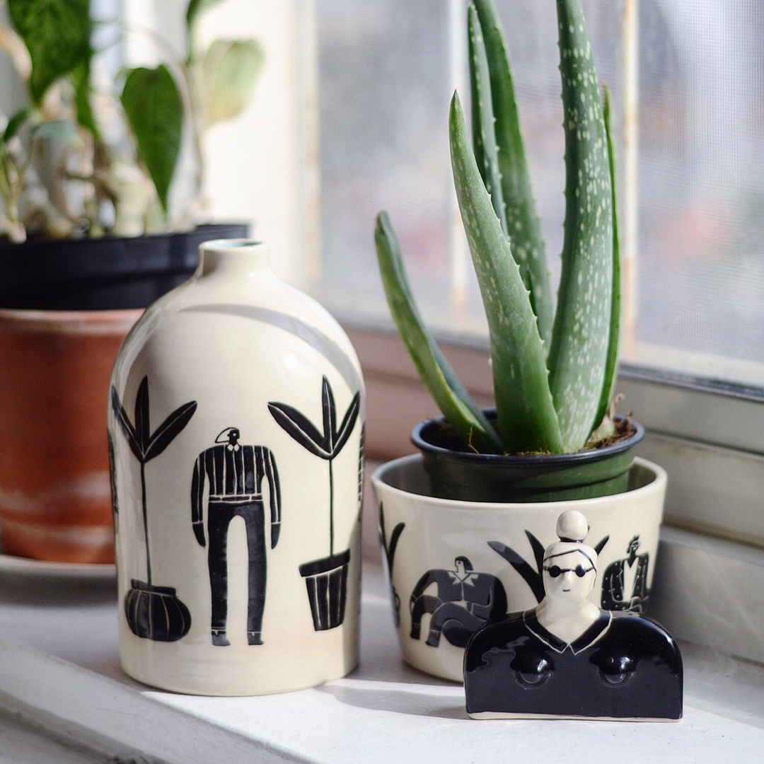 Ceramic planters with paintings of women by Miri Orenstein