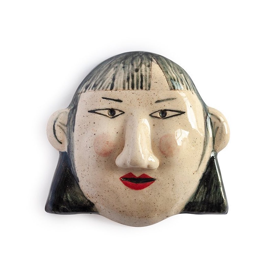 Illustrated ceramic sculpture by Malota