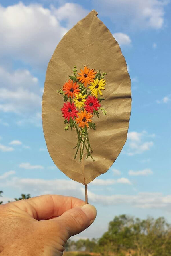 Hand embroidery on leaf by Solange Nunes