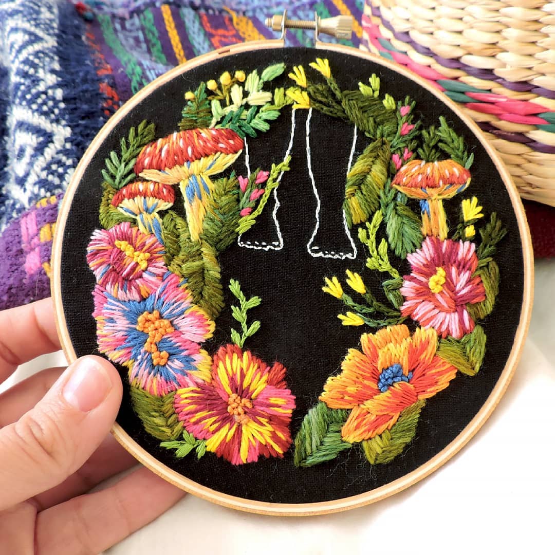 Embroidery on black fabric by Claudia González 