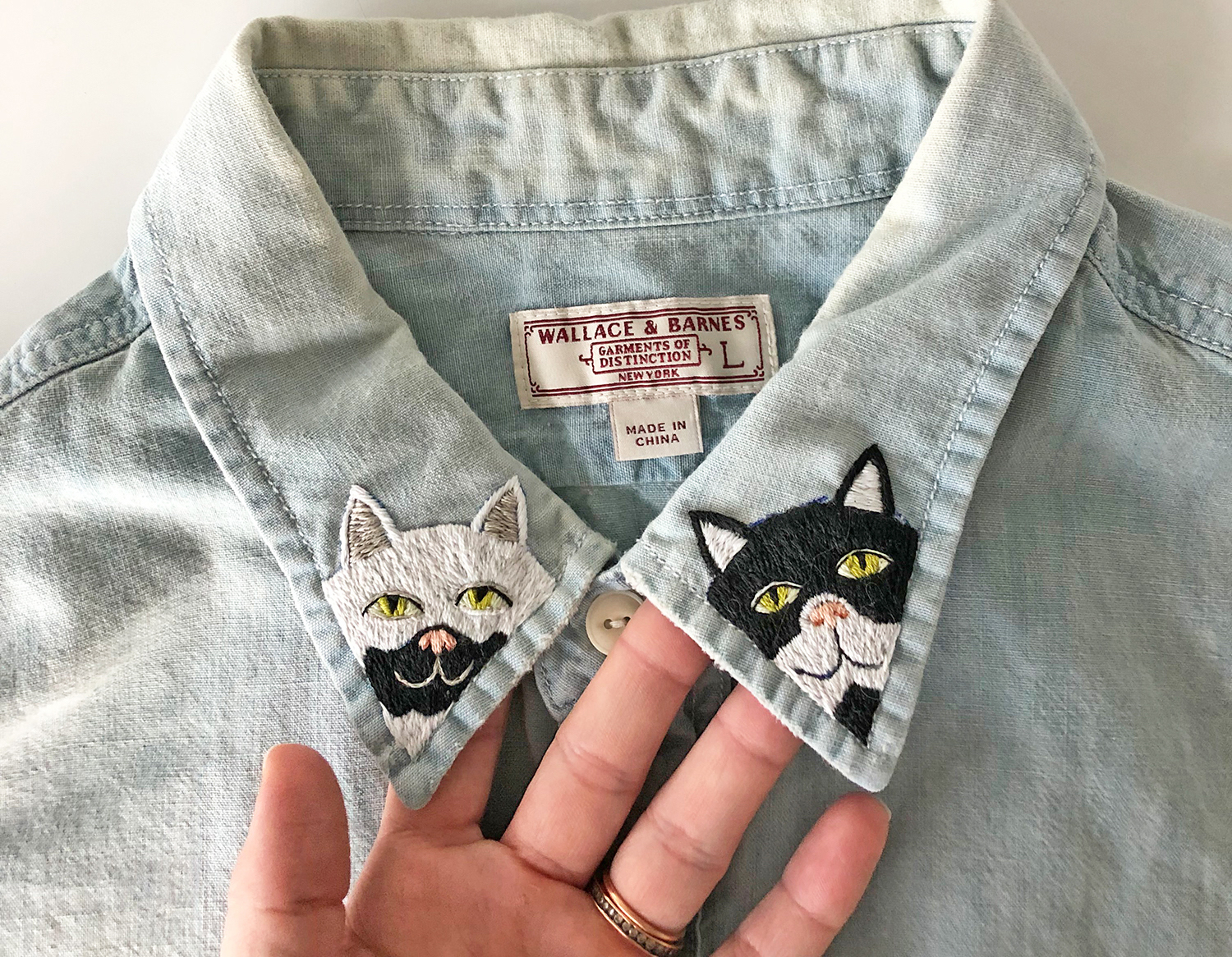 Embroidered cat clothing by Sara Barnes