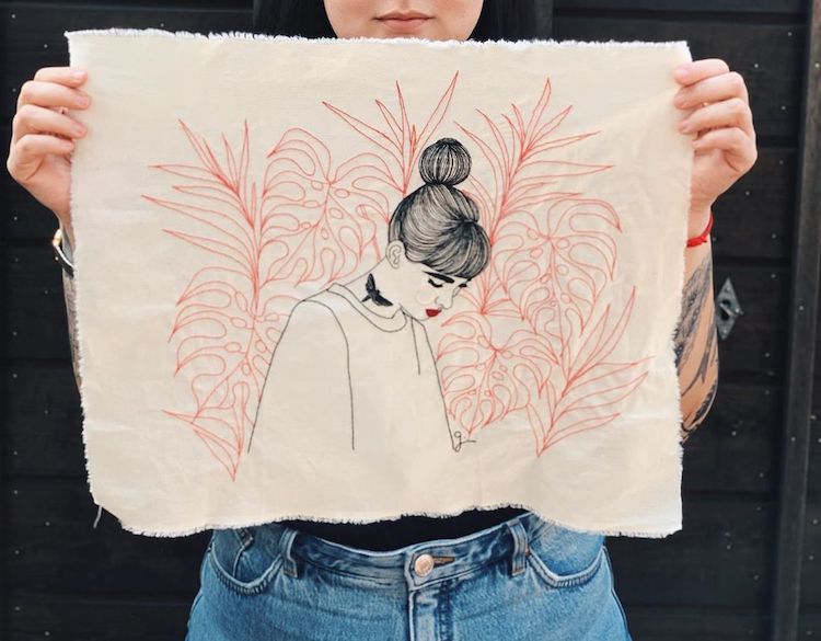 Hand-stitched hoop art by Giselle Quinto