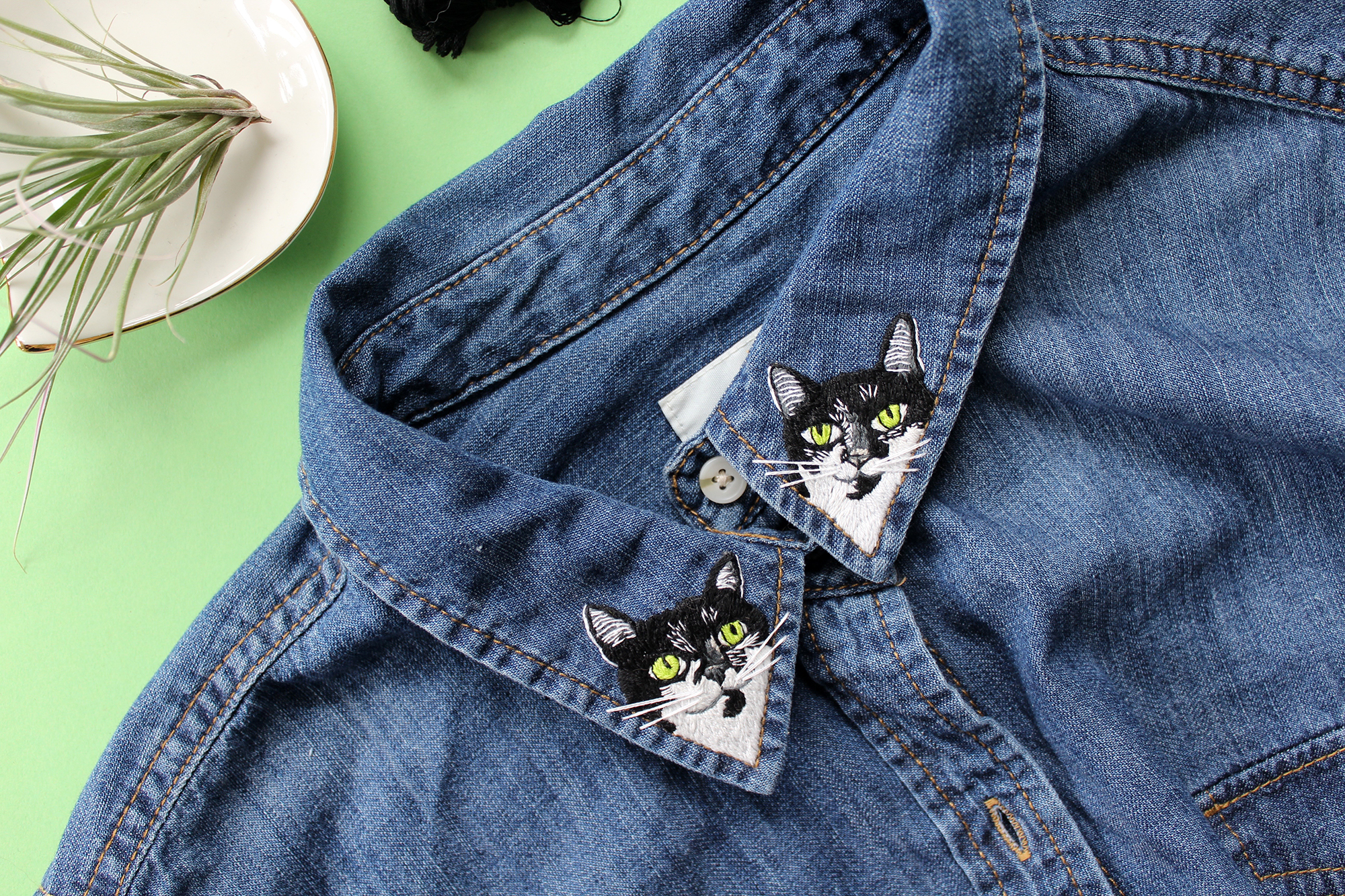 Embroidered collars with cats on them
