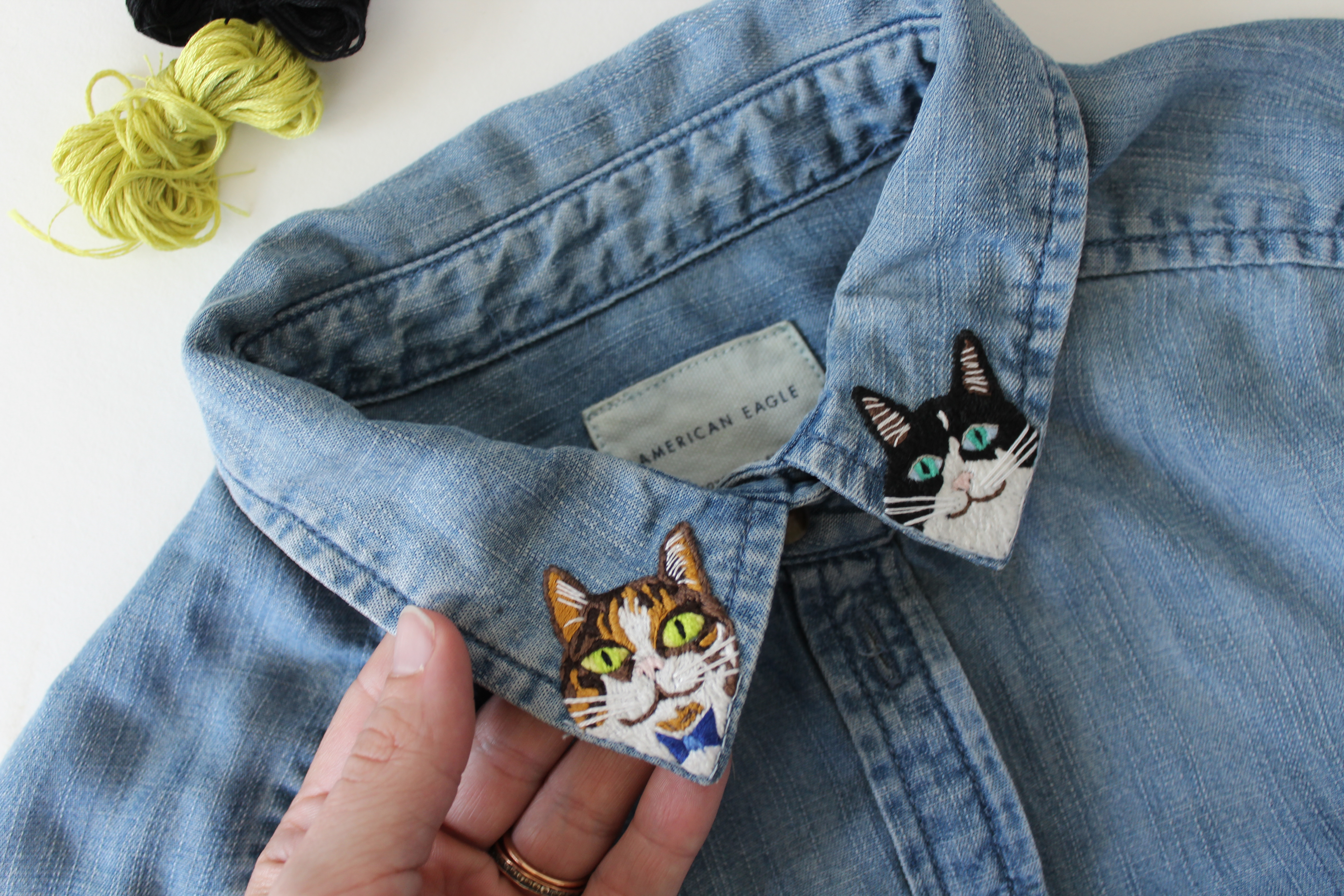 Embroidered collars with cats on them