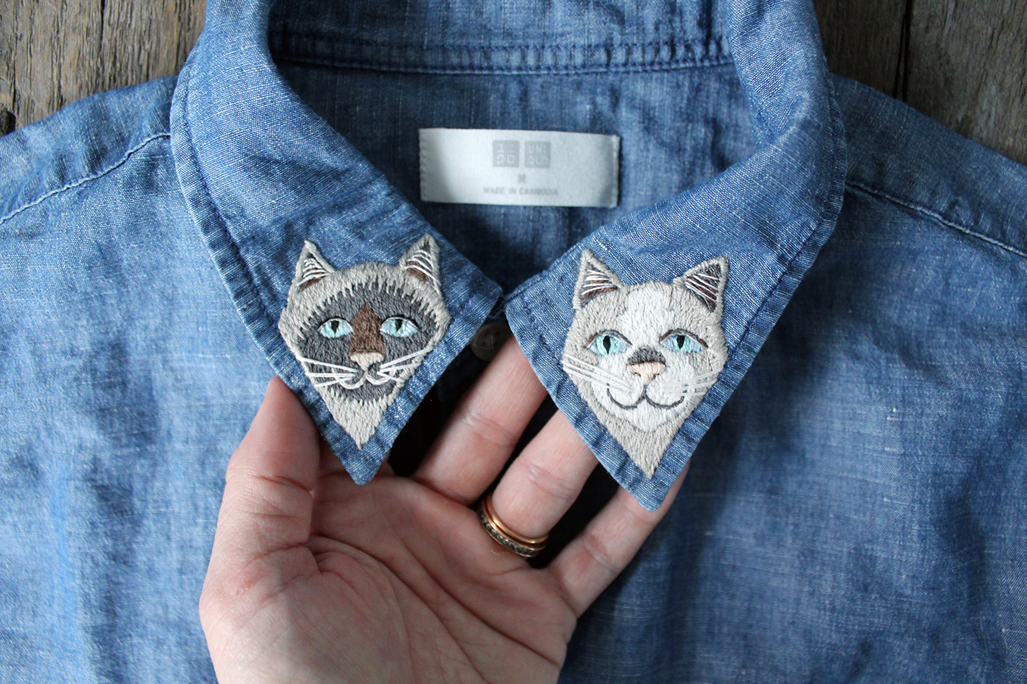 Embroidered collars with cats on them