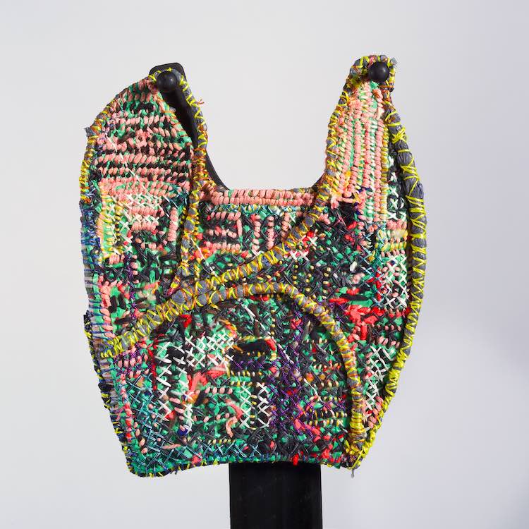 Embroidery art on plastic bag by Josh Blackwell