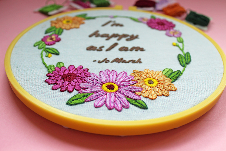 Floral embroidery featuring Little Women quote on a free embroidery pattern designed by Sara Barnes