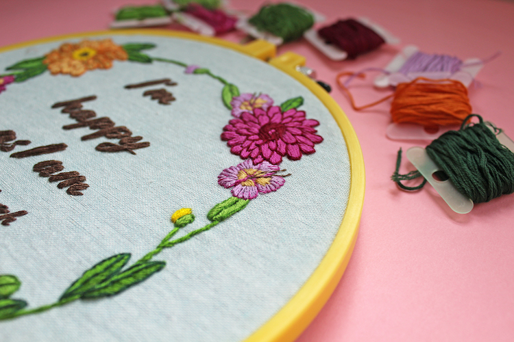 Floral embroidery featuring Little Women quote on a free embroidery pattern designed by Sara Barnes