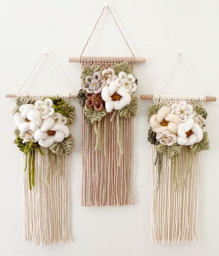 Modern macrame wall hanging with yarn flowers