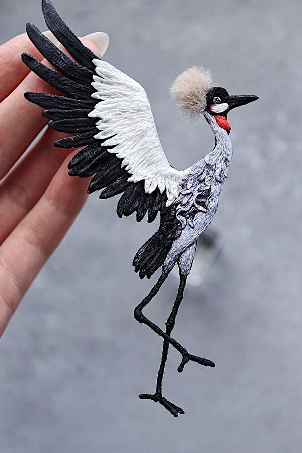 Lifelike bird embroidery by Pola Laamanen