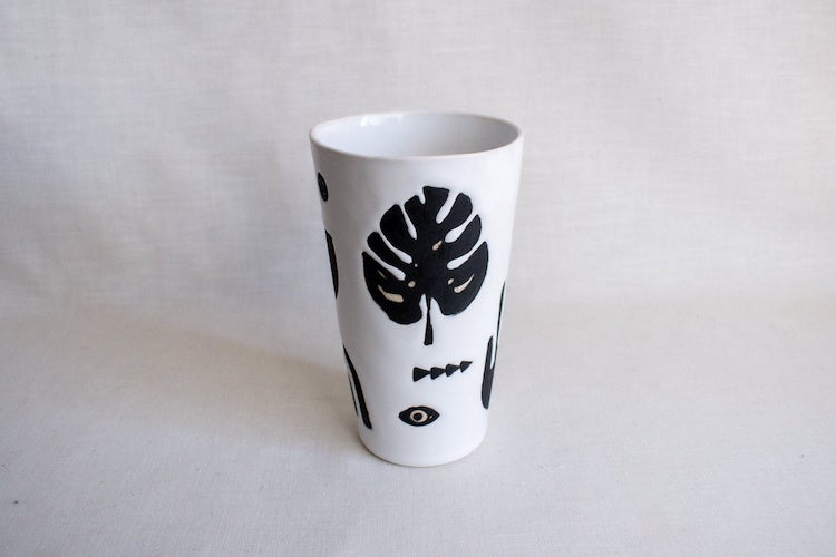 Illustrated ceramic cup