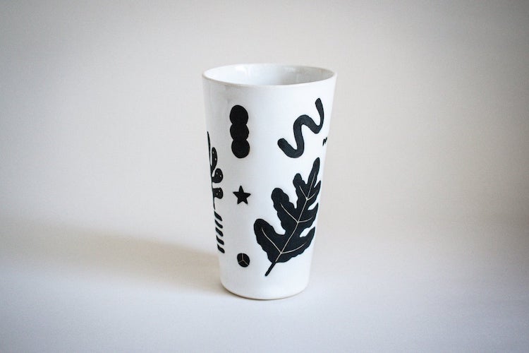 Illustrated ceramic cup