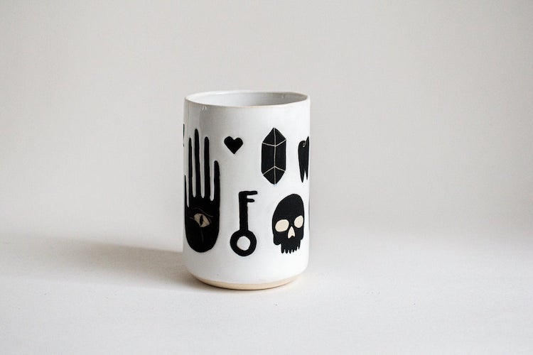 Illustrated ceramic cup