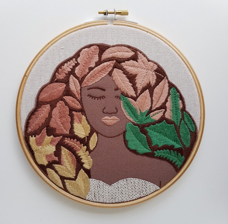 Embroidery pattern featuring a portrait of a woman with leaves in her hair