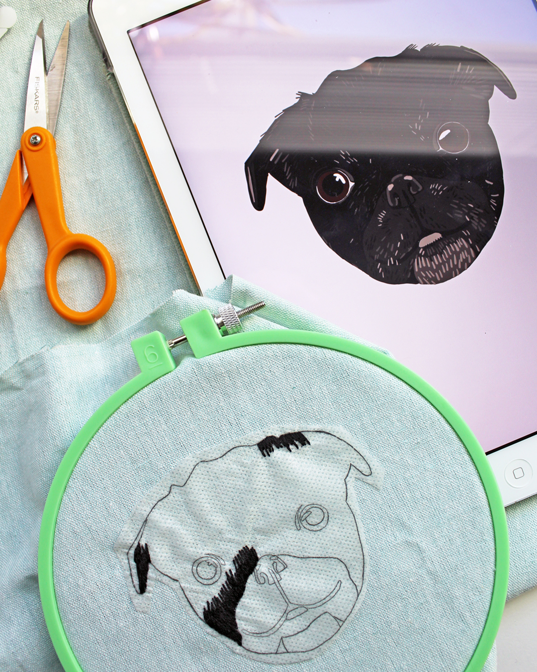 Embroidery of a pug and a digital sketch of a pug on an iPad