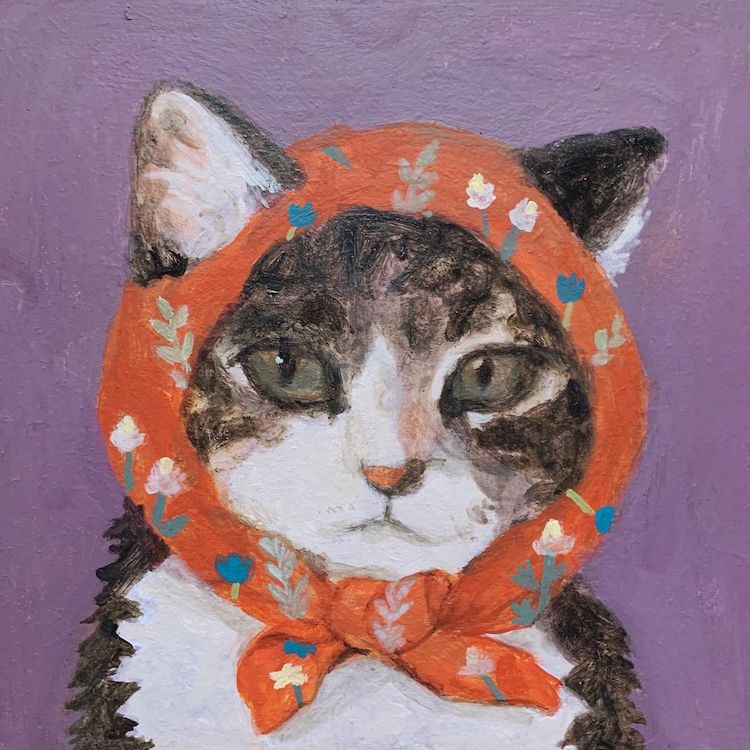 Illustration of a cat wearing a head scarf