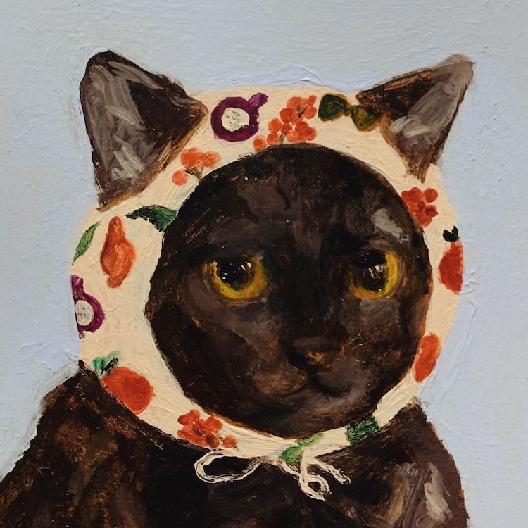 Illustration of a cat wearing a head scarf