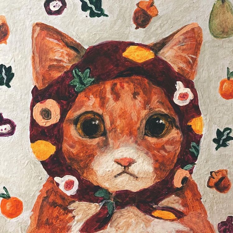 Illustration of a cat wearing a head scarf