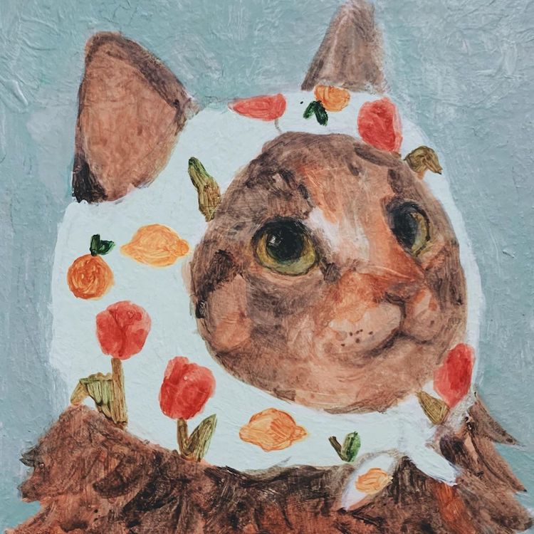 Illustration of a cat wearing a head scarf