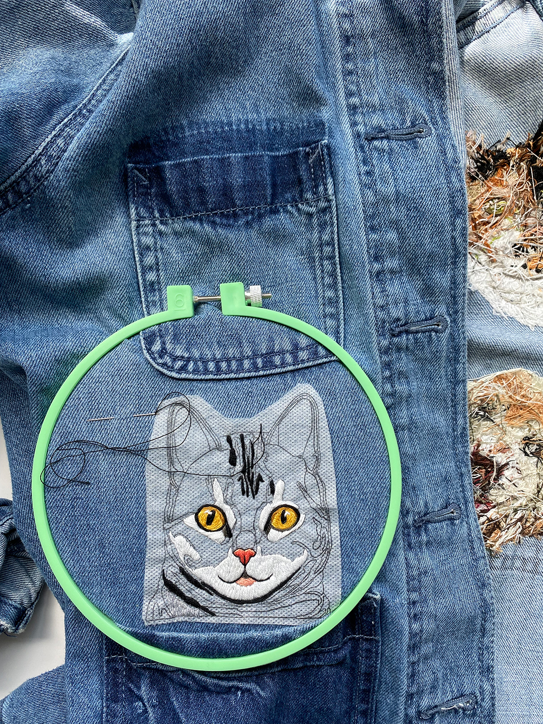 Cat embroidery on a jacket