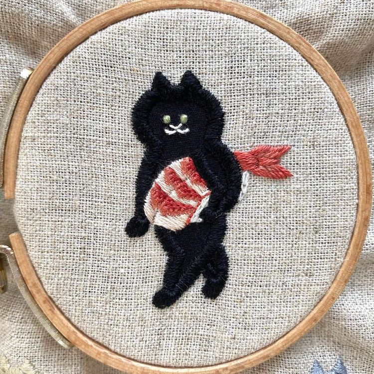 Cat Carrying a Fish