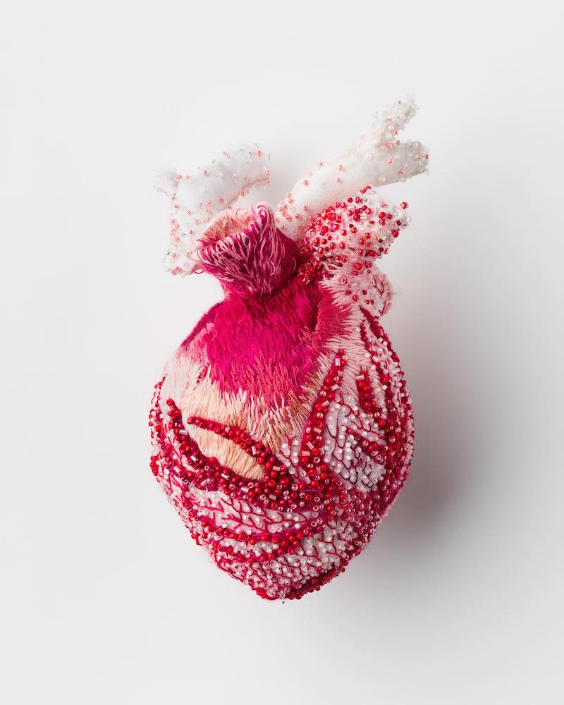 Heart sculpture featuring beading and embroidery by Ema Shin