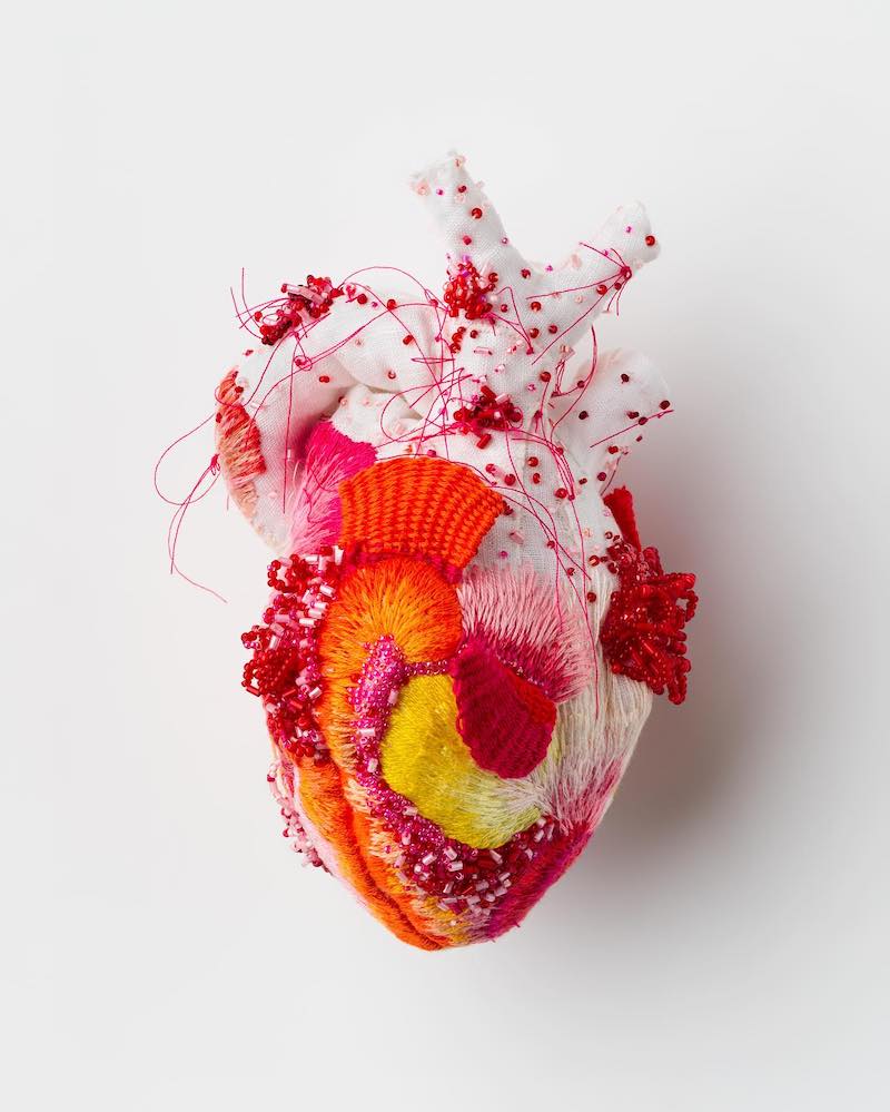 Heart sculpture featuring beading and embroidery by Ema Shin