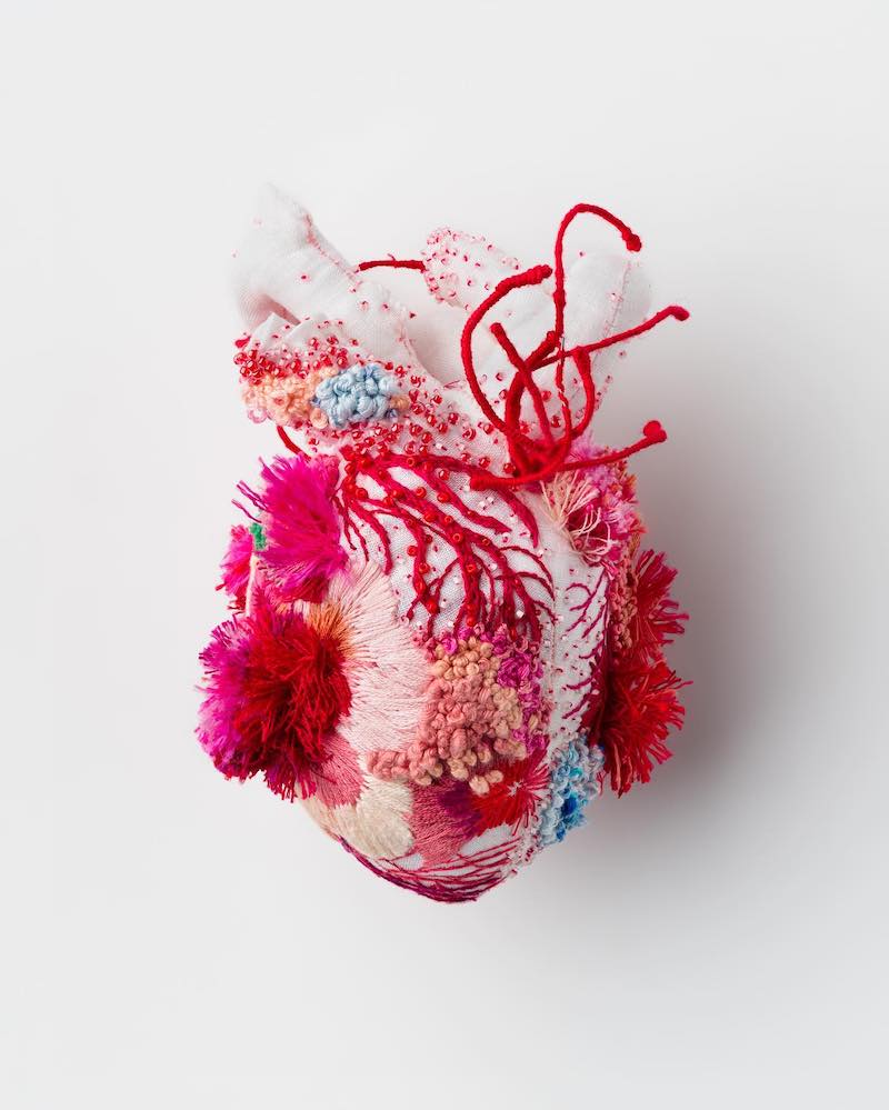 Heart sculpture featuring beading and embroidery by Ema Shin