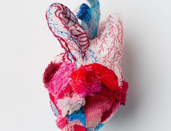 Heart sculpture featuring beading and embroidery by Ema Shin