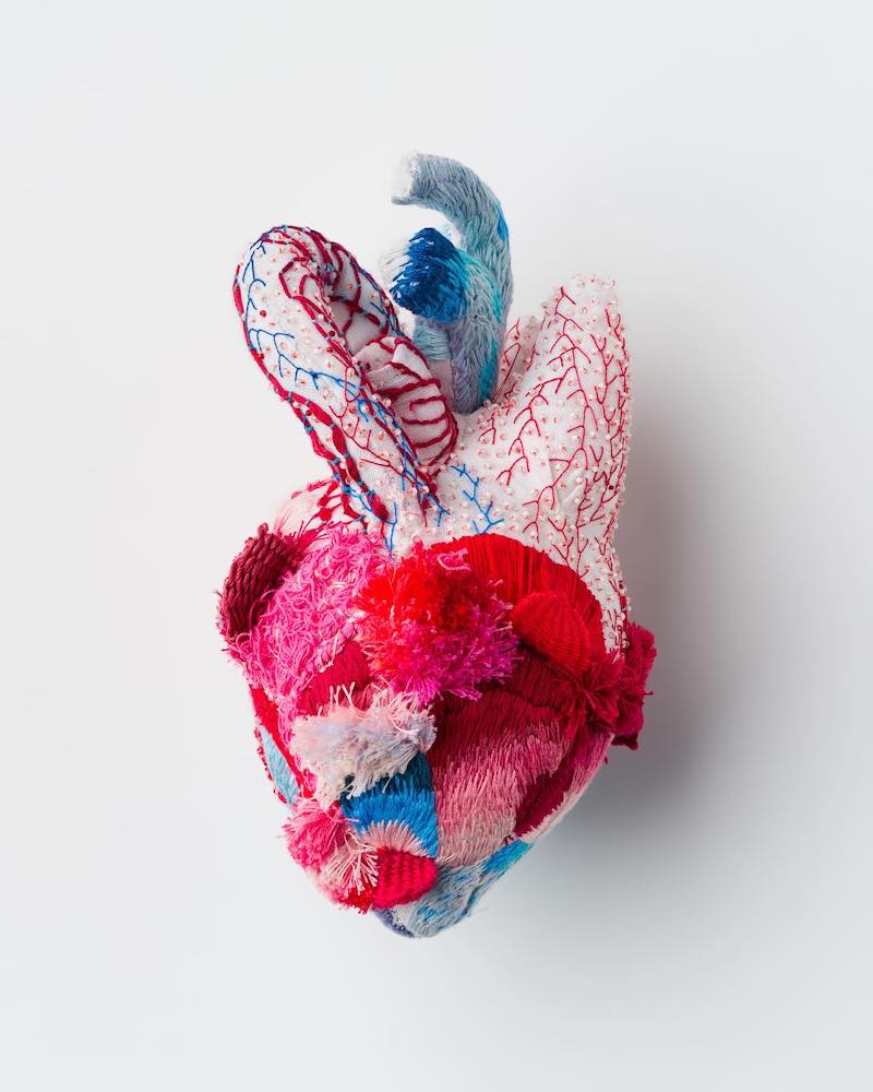 Heart sculpture featuring beading and embroidery by Ema Shin