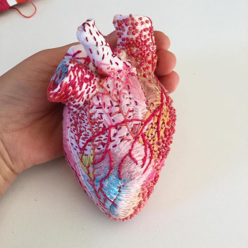 Heart sculpture featuring beading and embroidery by Ema Shin