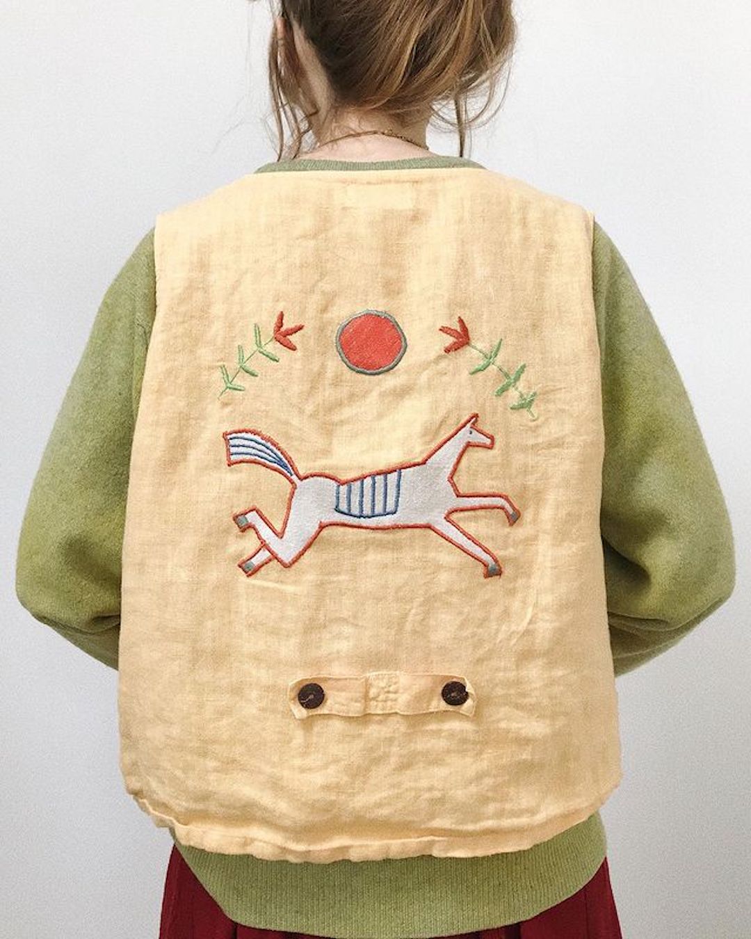 Embroidery on clothing by Madeleine Kemsley